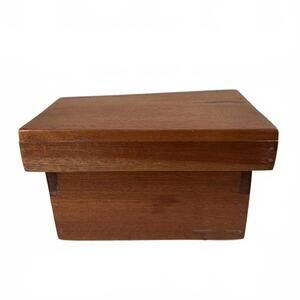A handcrafted wooden box by J. R. Curios from Kenya.